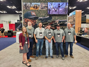 At the NRAAM, 2023: (L/R) Breanna, Mark, Justin, George, Eydin, and Chad